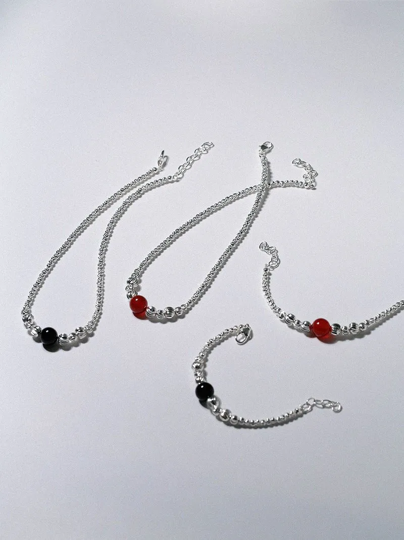 Graduated Silver Bean and Onyx Bracelet