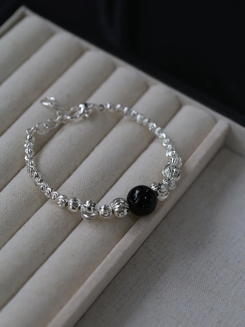 Graduated Silver Bean and Onyx Bracelet