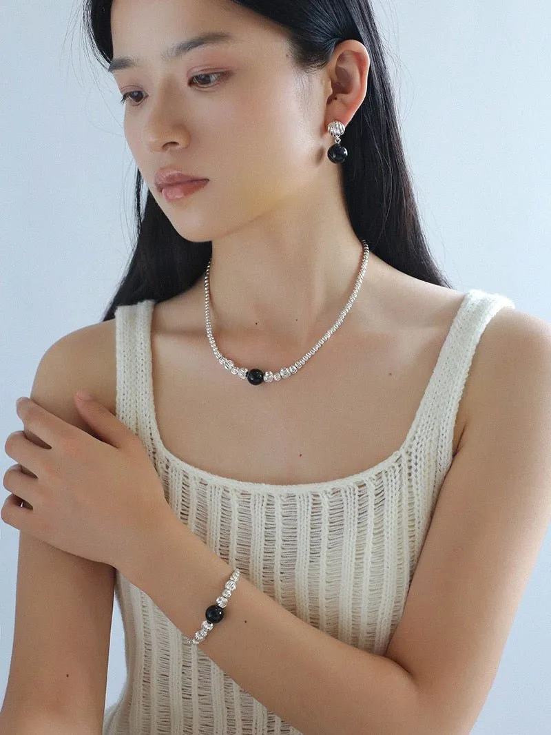 Graduated Silver Bean and Onyx Bracelet