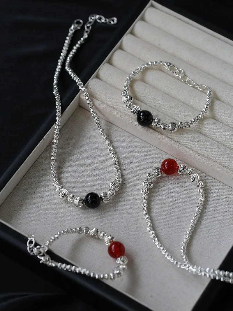 Graduated Silver Bean and Onyx Bracelet